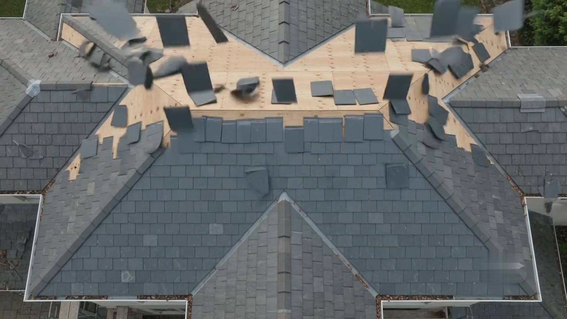 New tiles being installed across the roof